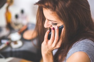 Harming your self-esteem - girl on phone