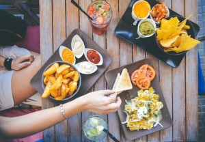 girls eating food.My girlfriends share their advice on how to get out of a funk and into a good mood fast. These 51 tips will have you feeling happy and confident again!
