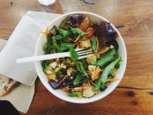Counting calories and eating a quinoa bowl.