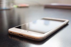 Cyberbullying - Iphone on desk