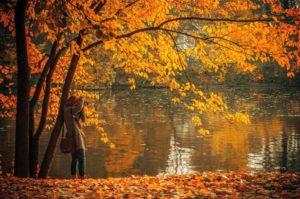 Girl in the fall leaves - Time Change - Daylight Saving