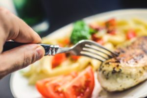 Counting calories and chicken with tomatoes and pasta.